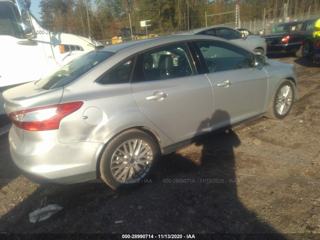 Photo 3 VIN: 1FAHP3H27CL348375 - FORD FOCUS 