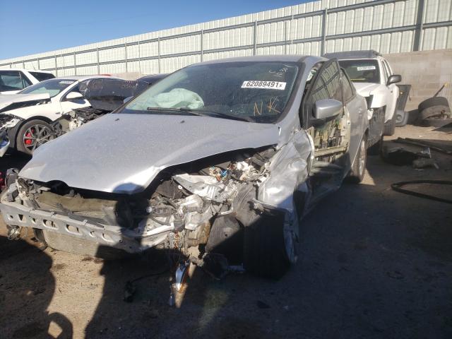 Photo 1 VIN: 1FAHP3H27CL373308 - FORD FOCUS SEL 