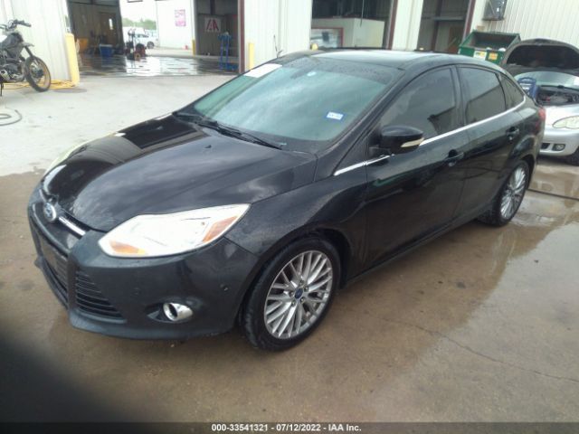 Photo 1 VIN: 1FAHP3H27CL385961 - FORD FOCUS 