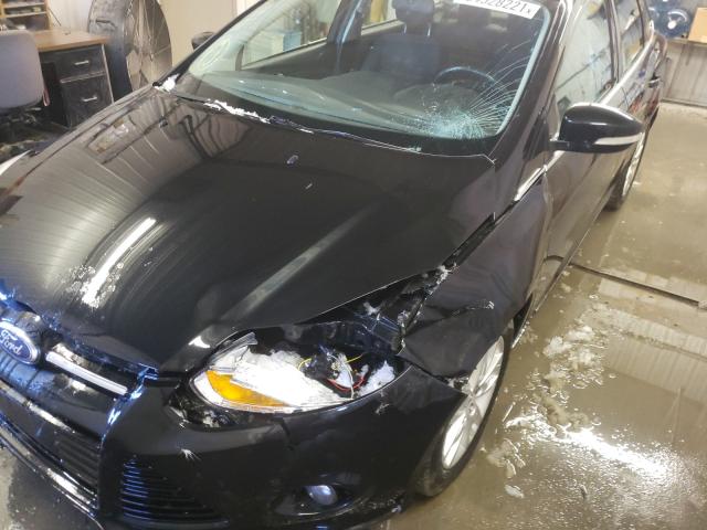 Photo 8 VIN: 1FAHP3H27CL388083 - FORD FOCUS SEL 