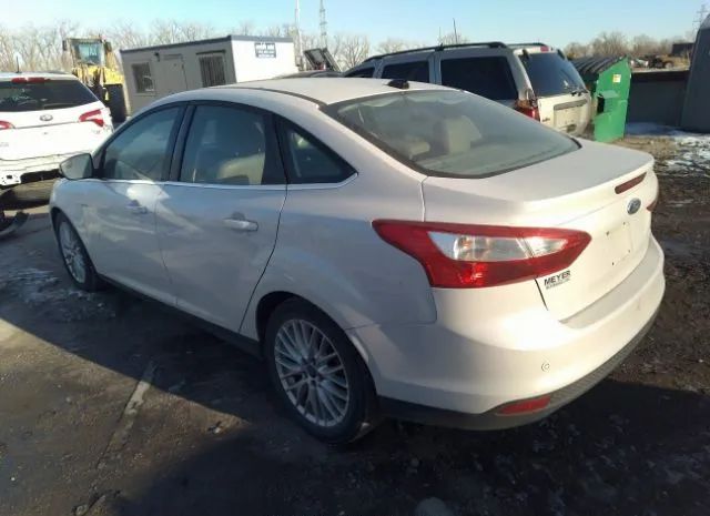 Photo 2 VIN: 1FAHP3H27CL435631 - FORD FOCUS 