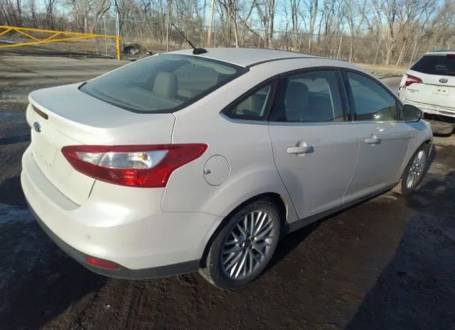 Photo 3 VIN: 1FAHP3H27CL435631 - FORD FOCUS 