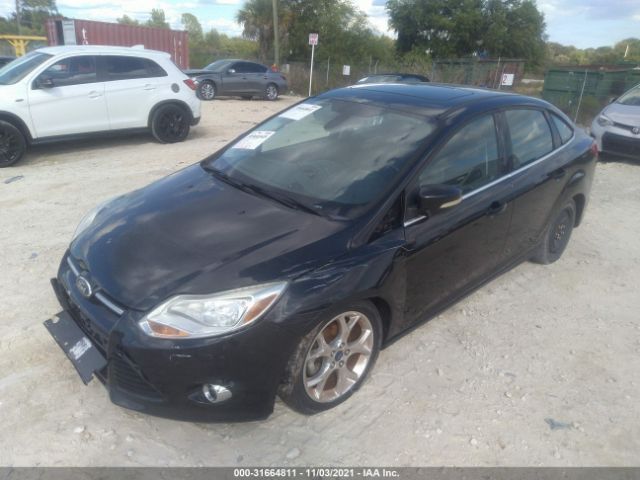 Photo 1 VIN: 1FAHP3H27CL461808 - FORD FOCUS 