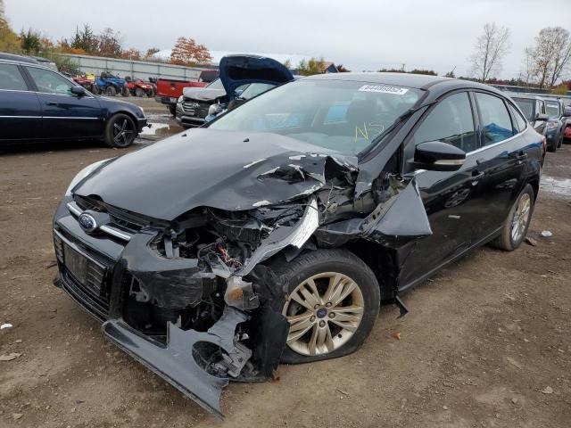 Photo 1 VIN: 1FAHP3H27CL474476 - FORD FOCUS SEL 