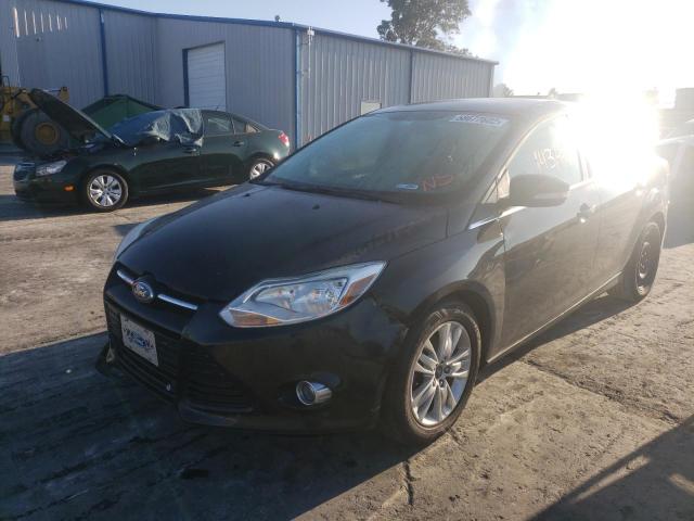 Photo 1 VIN: 1FAHP3H28CL123558 - FORD FOCUS SEL 