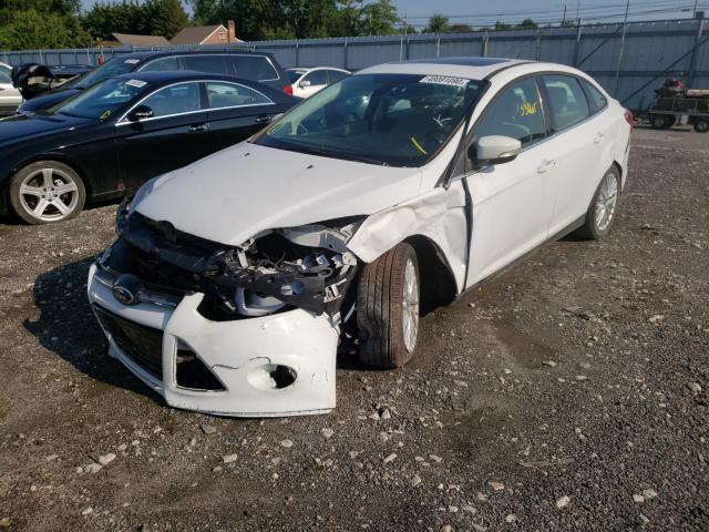 Photo 1 VIN: 1FAHP3H28CL200784 - FORD FOCUS SEL 