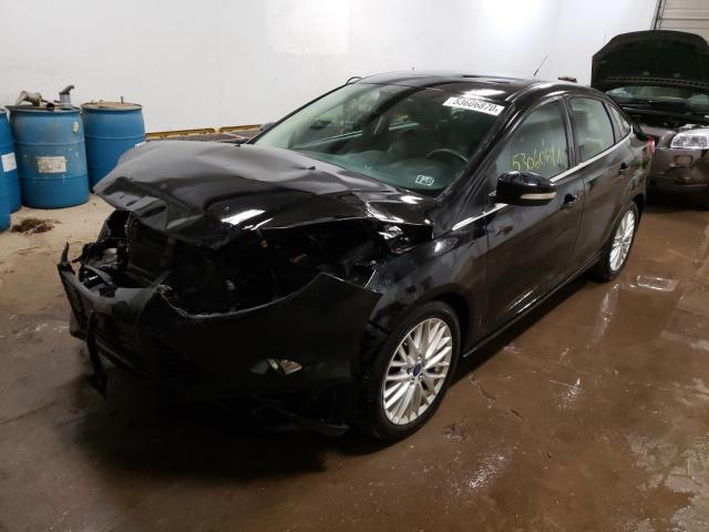 Photo 1 VIN: 1FAHP3H28CL219271 - FORD FOCUS SEL 