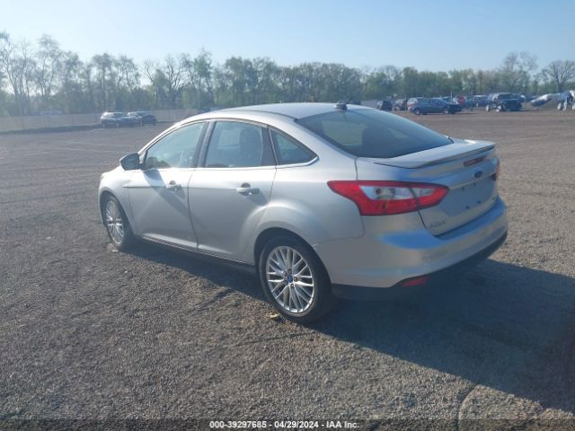 Photo 2 VIN: 1FAHP3H28CL226401 - FORD FOCUS 