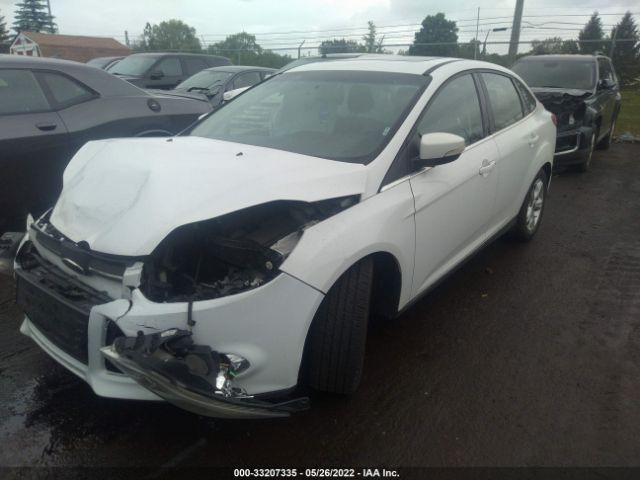 Photo 1 VIN: 1FAHP3H28CL372149 - FORD FOCUS 