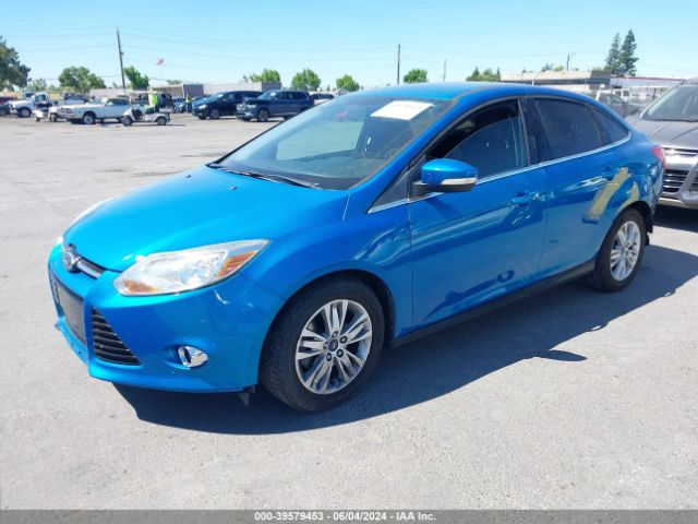 Photo 1 VIN: 1FAHP3H28CL373043 - FORD FOCUS 