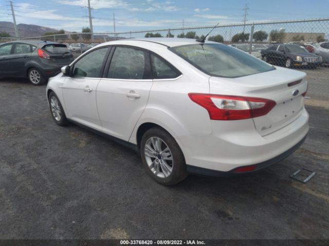 Photo 2 VIN: 1FAHP3H28CL373432 - FORD FOCUS 