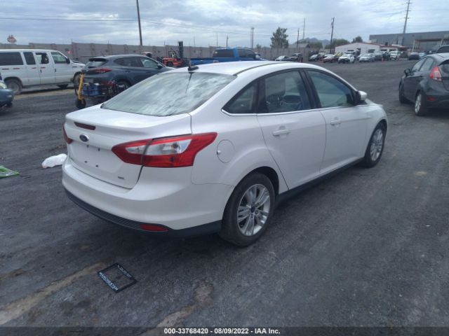 Photo 3 VIN: 1FAHP3H28CL373432 - FORD FOCUS 