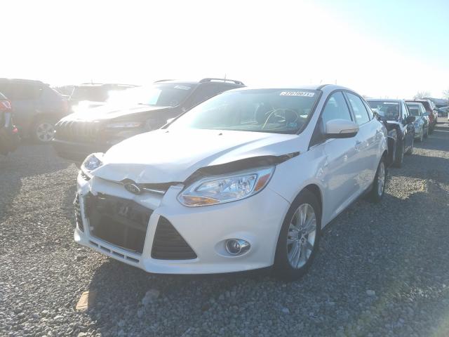 Photo 1 VIN: 1FAHP3H28CL397035 - FORD FOCUS SEL 