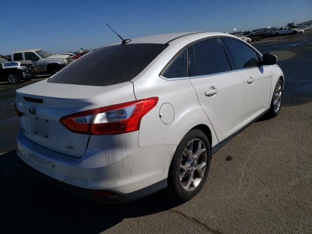 Photo 3 VIN: 1FAHP3H28CL416103 - FORD FOCUS 