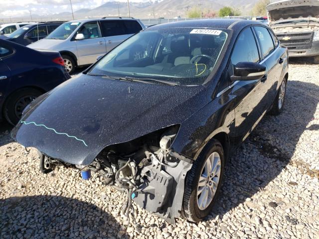 Photo 1 VIN: 1FAHP3H28CL479735 - FORD FOCUS SEL 