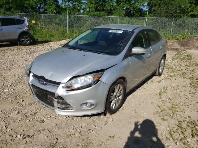 Photo 1 VIN: 1FAHP3H29CL114786 - FORD FOCUS SEL 