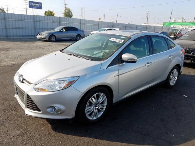 Photo 1 VIN: 1FAHP3H29CL145701 - FORD FOCUS SEL 