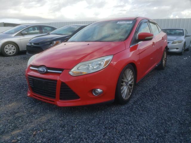 Photo 1 VIN: 1FAHP3H29CL210983 - FORD FOCUS SEL 