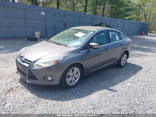 Photo 1 VIN: 1FAHP3H29CL269953 - FORD FOCUS 