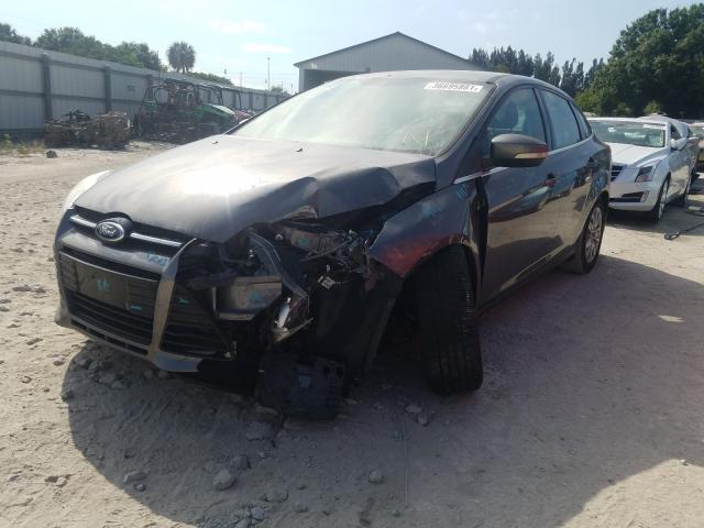 Photo 1 VIN: 1FAHP3H29CL348295 - FORD FOCUS SEL 