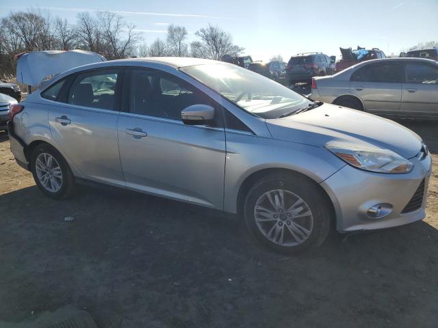 Photo 3 VIN: 1FAHP3H29CL349740 - FORD FOCUS 