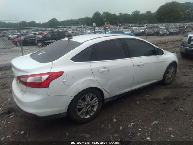 Photo 3 VIN: 1FAHP3H29CL360611 - FORD FOCUS 