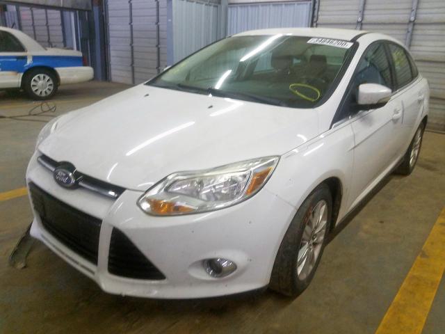 Photo 1 VIN: 1FAHP3H29CL363234 - FORD FOCUS SEL 