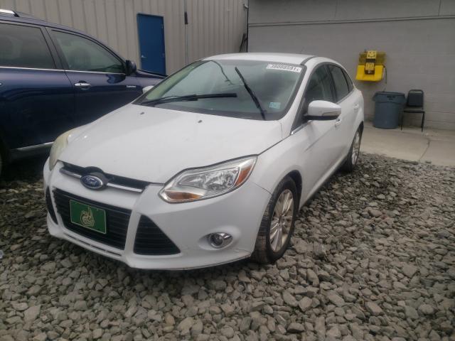 Photo 1 VIN: 1FAHP3H2XCL123139 - FORD FOCUS SEL 