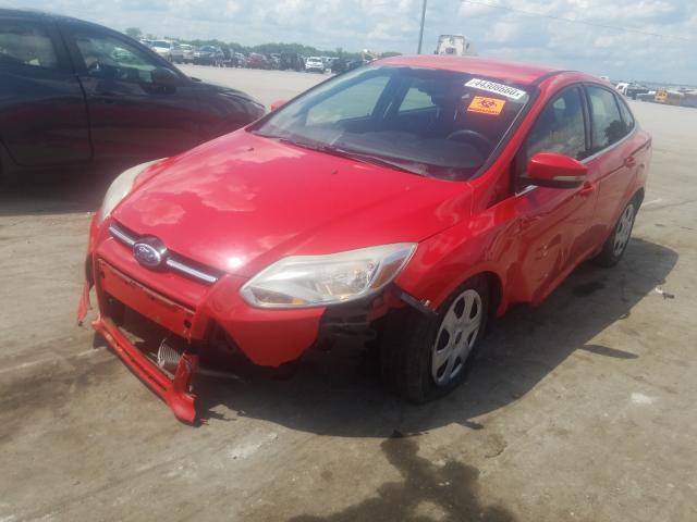 Photo 1 VIN: 1FAHP3H2XCL142077 - FORD FOCUS SEL 