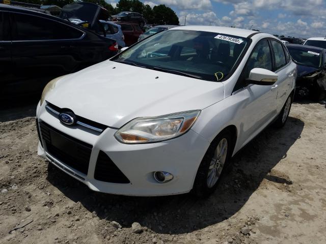 Photo 1 VIN: 1FAHP3H2XCL168890 - FORD FOCUS SEL 