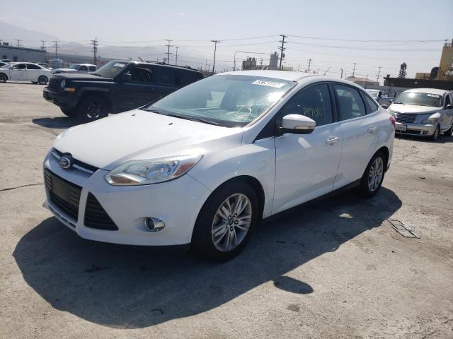 Photo 1 VIN: 1FAHP3H2XCL184670 - FORD FOCUS 