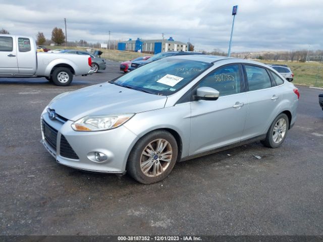Photo 1 VIN: 1FAHP3H2XCL195944 - FORD FOCUS 