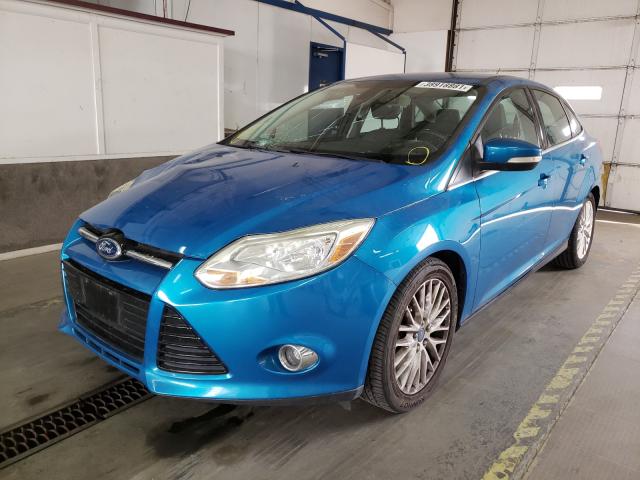 Photo 1 VIN: 1FAHP3H2XCL290861 - FORD FOCUS SEL 