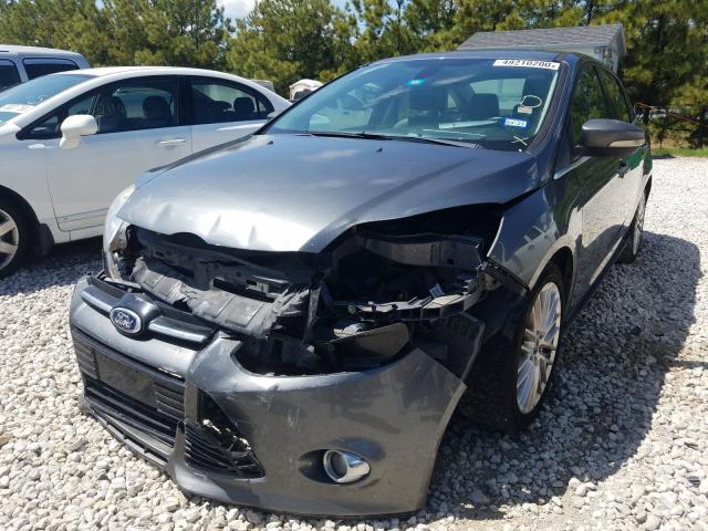 Photo 1 VIN: 1FAHP3H2XCL339041 - FORD FOCUS SEL 