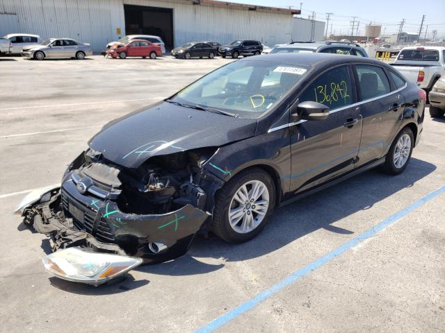 Photo 1 VIN: 1FAHP3H2XCL349200 - FORD FOCUS SEL 