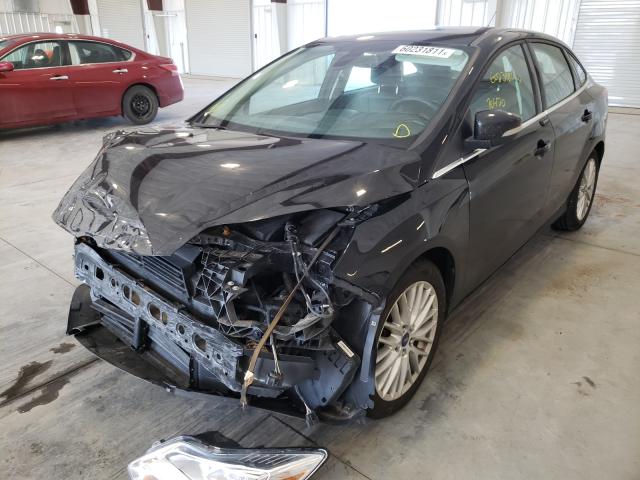 Photo 1 VIN: 1FAHP3H2XCL362397 - FORD FOCUS SEL 