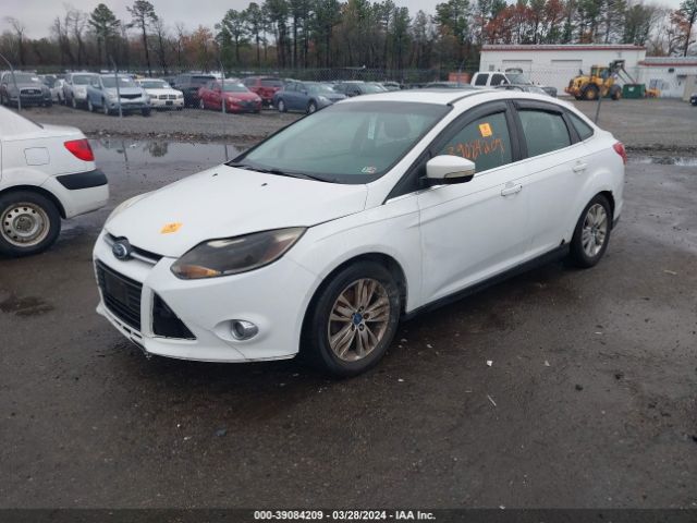 Photo 1 VIN: 1FAHP3H2XCL373674 - FORD FOCUS 