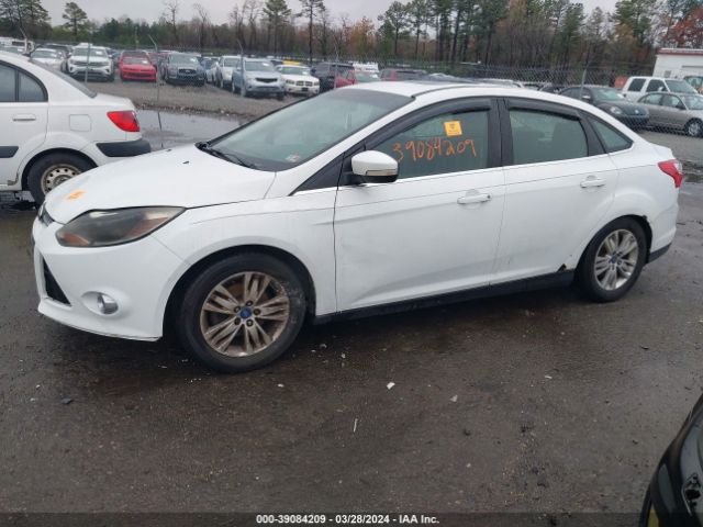 Photo 5 VIN: 1FAHP3H2XCL373674 - FORD FOCUS 