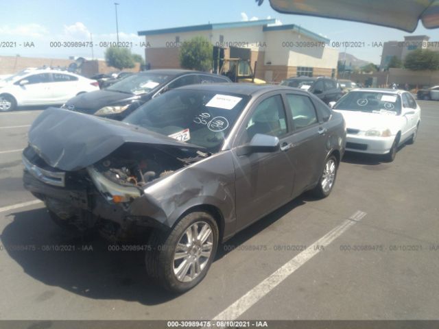 Photo 1 VIN: 1FAHP3HN1AW217657 - FORD FOCUS 