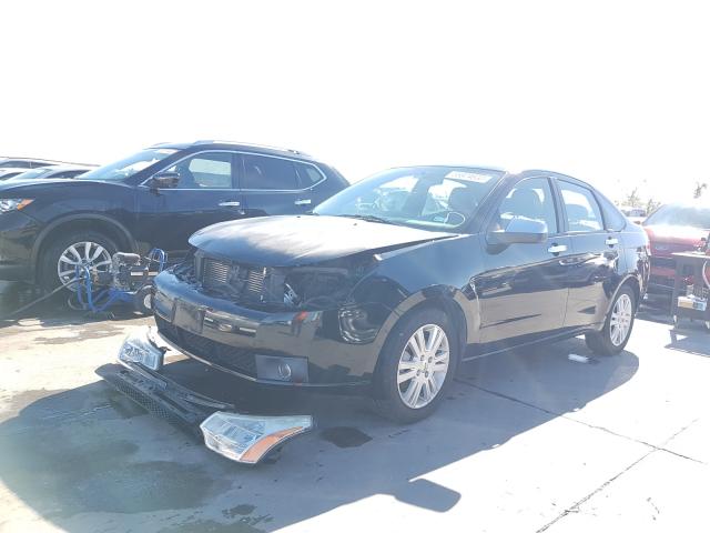 Photo 1 VIN: 1FAHP3HN1BW164704 - FORD FOCUS SEL 