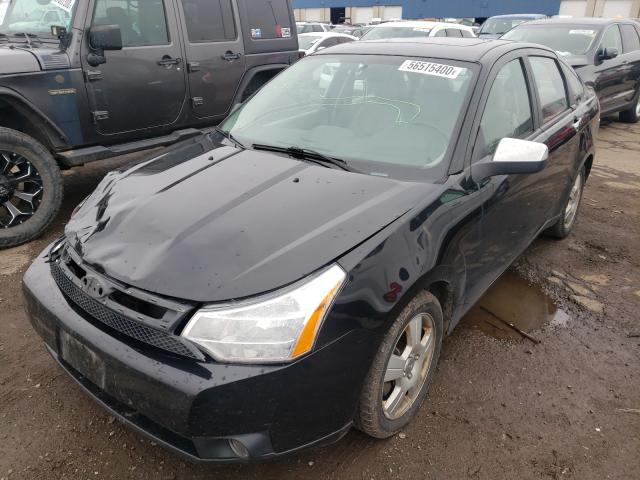 Photo 1 VIN: 1FAHP3HN1BW201248 - FORD FOCUS SEL 