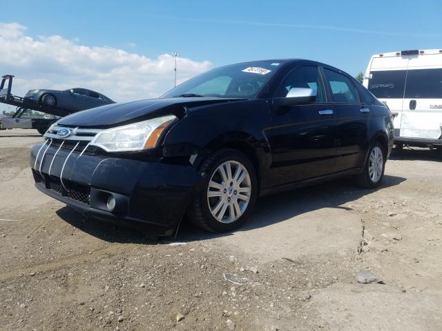 Photo 1 VIN: 1FAHP3HN2BW177557 - FORD FOCUS SEL 