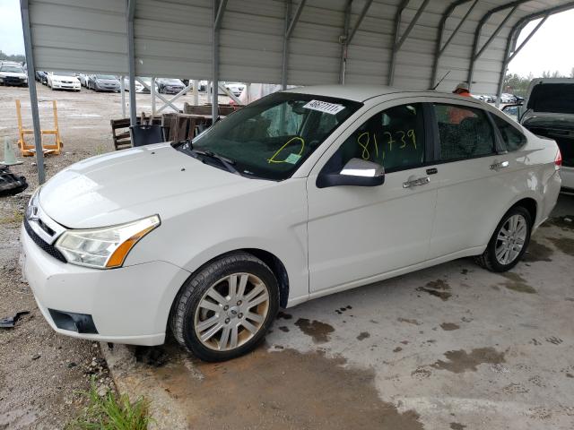 Photo 1 VIN: 1FAHP3HN4AW110683 - FORD FOCUS SEL 