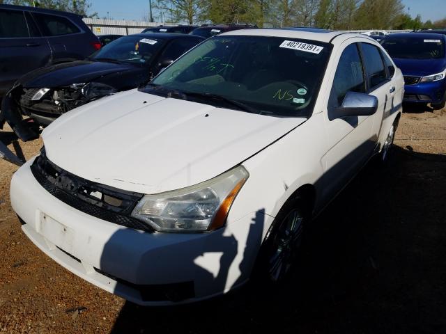 Photo 1 VIN: 1FAHP3HN6AW217010 - FORD FOCUS SEL 