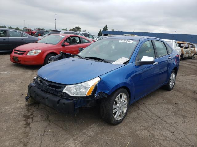 Photo 1 VIN: 1FAHP3HN6BW139197 - FORD FOCUS SEL 