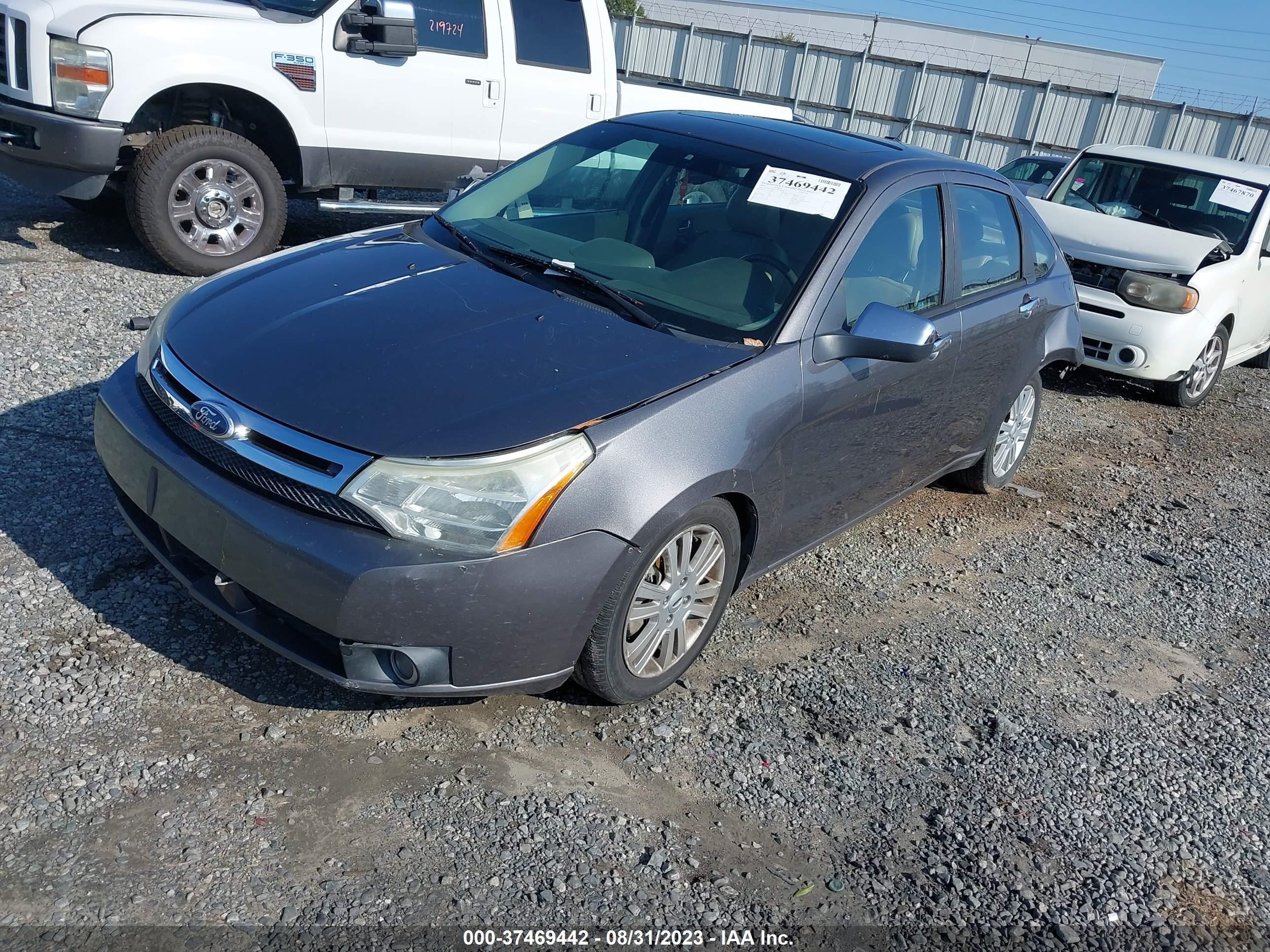 Photo 1 VIN: 1FAHP3HNXAW255923 - FORD FOCUS 