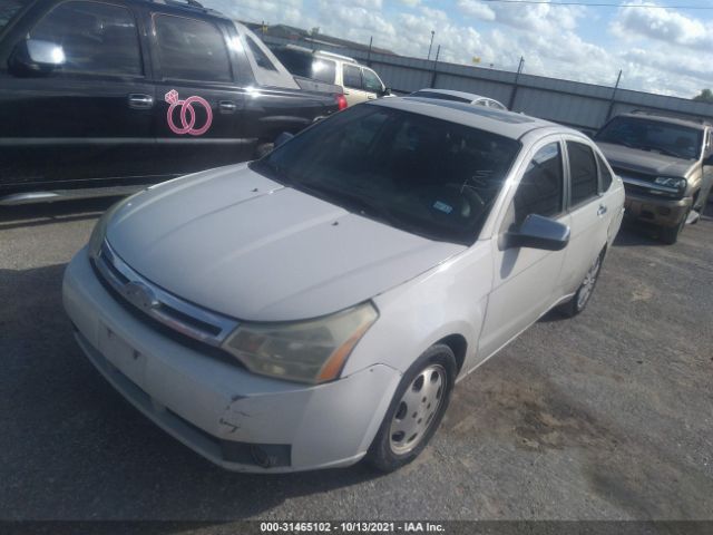 Photo 1 VIN: 1FAHP3HNXBW148937 - FORD FOCUS 