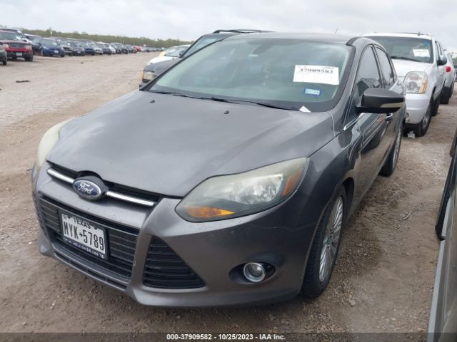 Photo 1 VIN: 1FAHP3J23CL370304 - FORD FOCUS 