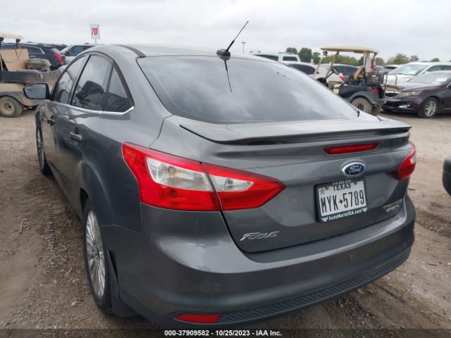 Photo 2 VIN: 1FAHP3J23CL370304 - FORD FOCUS 