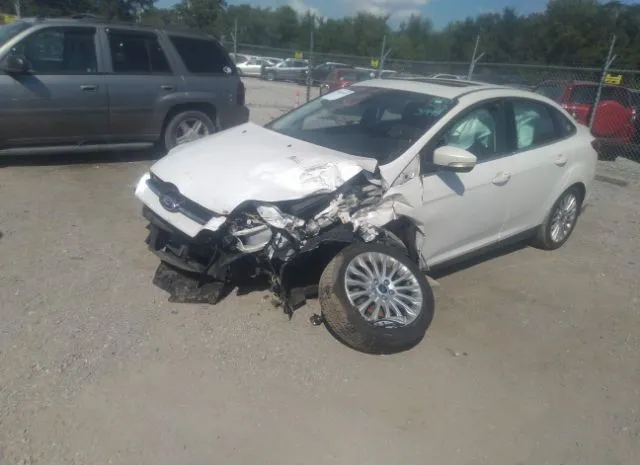 Photo 1 VIN: 1FAHP3J23CL473948 - FORD FOCUS 